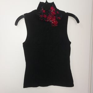 Sleeveles turtleneck